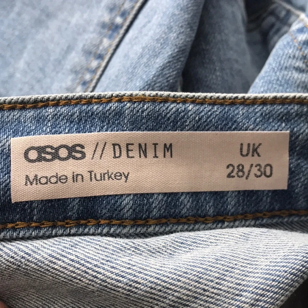 ASOSHigh waisted Bum Ripped jeans